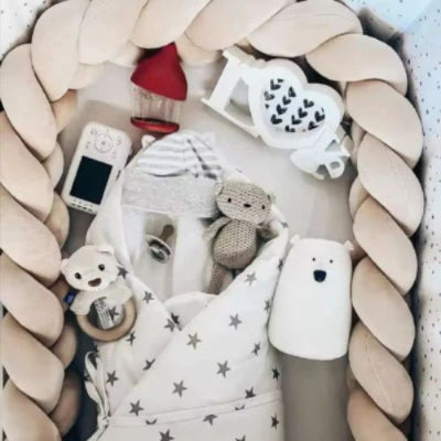 tresse-de-lit-cocon-bebe-reducteur