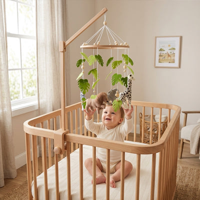 mobile-bébé-lit-à-barreaux