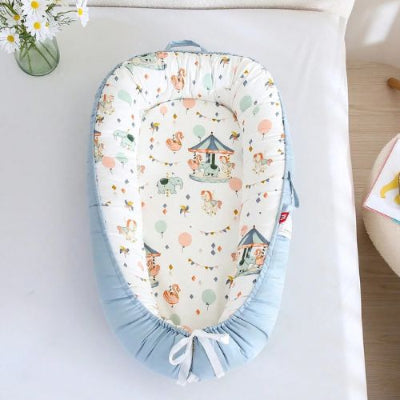 reducteur-de-lit-bebe-nid-douillet-cocon-protecteur