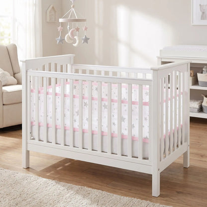 tour-de-lit-rose-etoiles-lit-à-barreaux-chambre-bébé